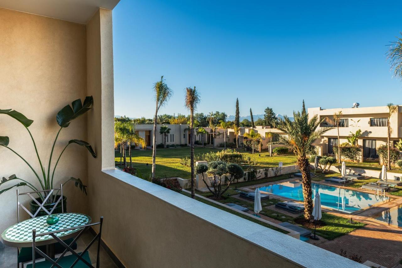 Suite with Private Terrace and Pool View,1128880392:JPEG