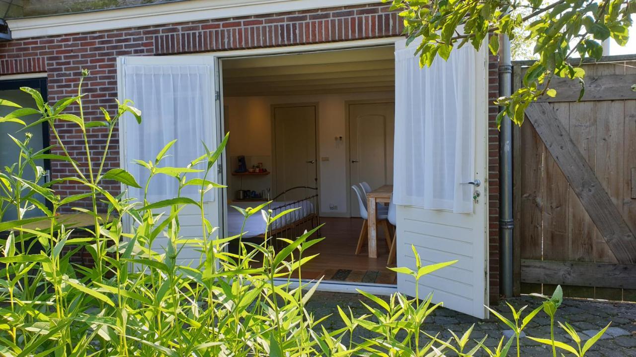 Vierpersoonskamer met Uitzicht op de Tuin - Bijgebouw