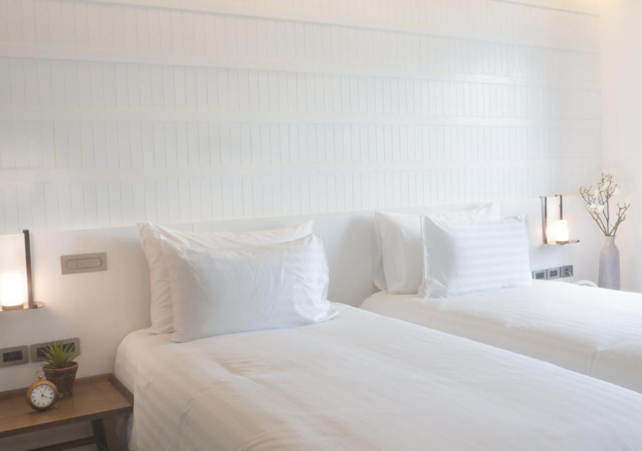 Serene White Twin Room 24 Hours Room