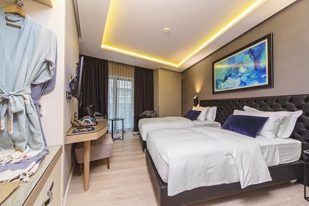 Deluxe Üç Kişilik Oda