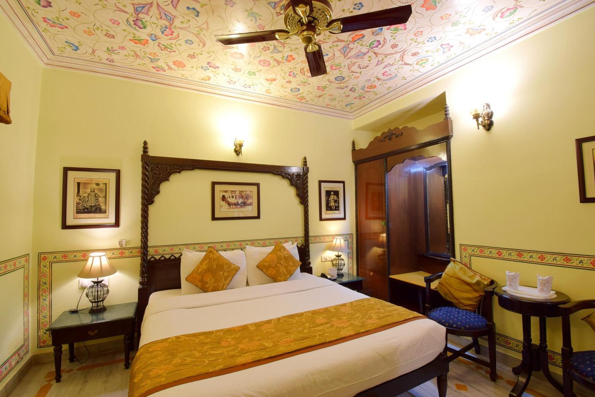 Royal Deluxe Family: Free pickup on arrival from train or bus station. Enjoy a daily Rajasthani dance & music show from 7–9 PM, swimming pool, and a dedicated travel desk to assist with local sightseeing tours, intercity travel arrangements & activit