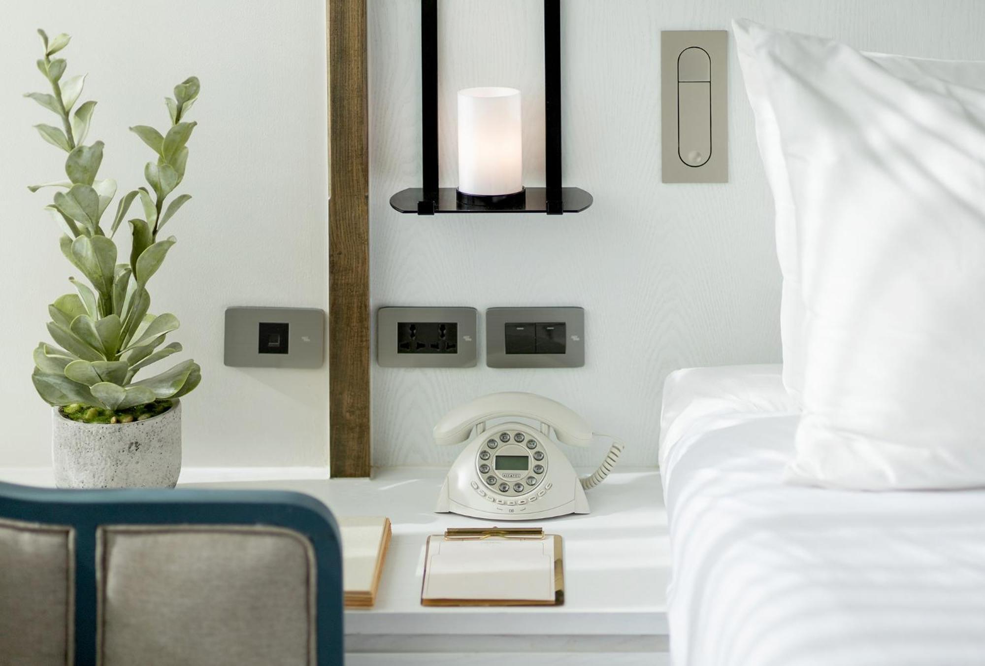 Serene White Twin Room 24 Hours Room