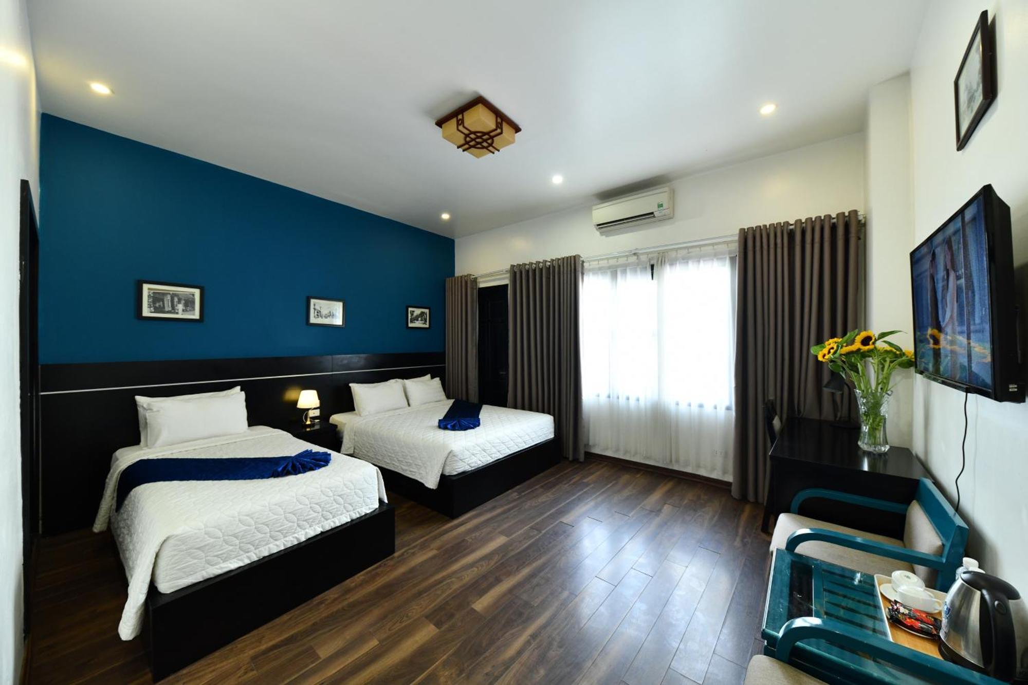 Deluxe Triple Room City View