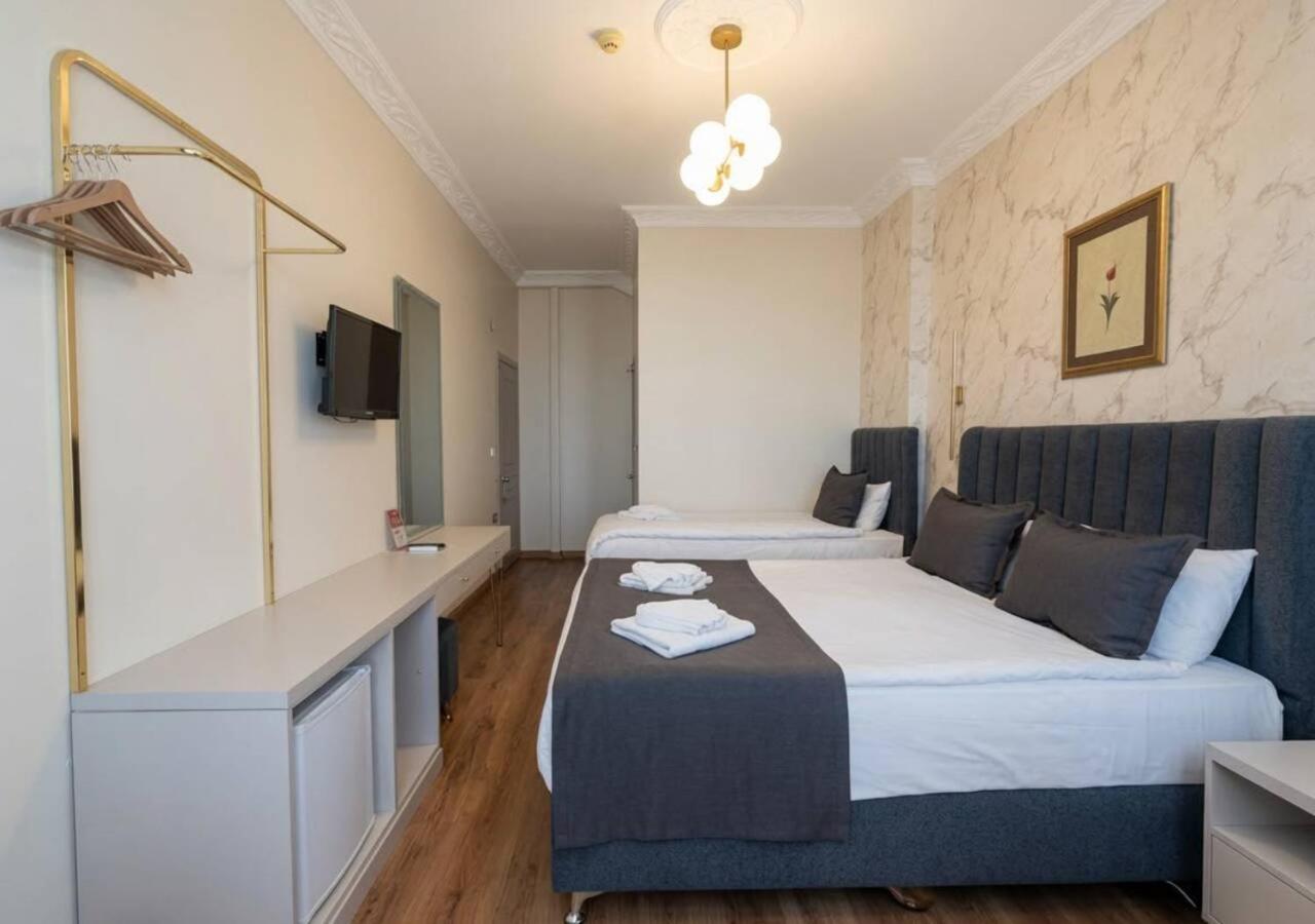Deluxe Dreibettzimmer mit Meerblick