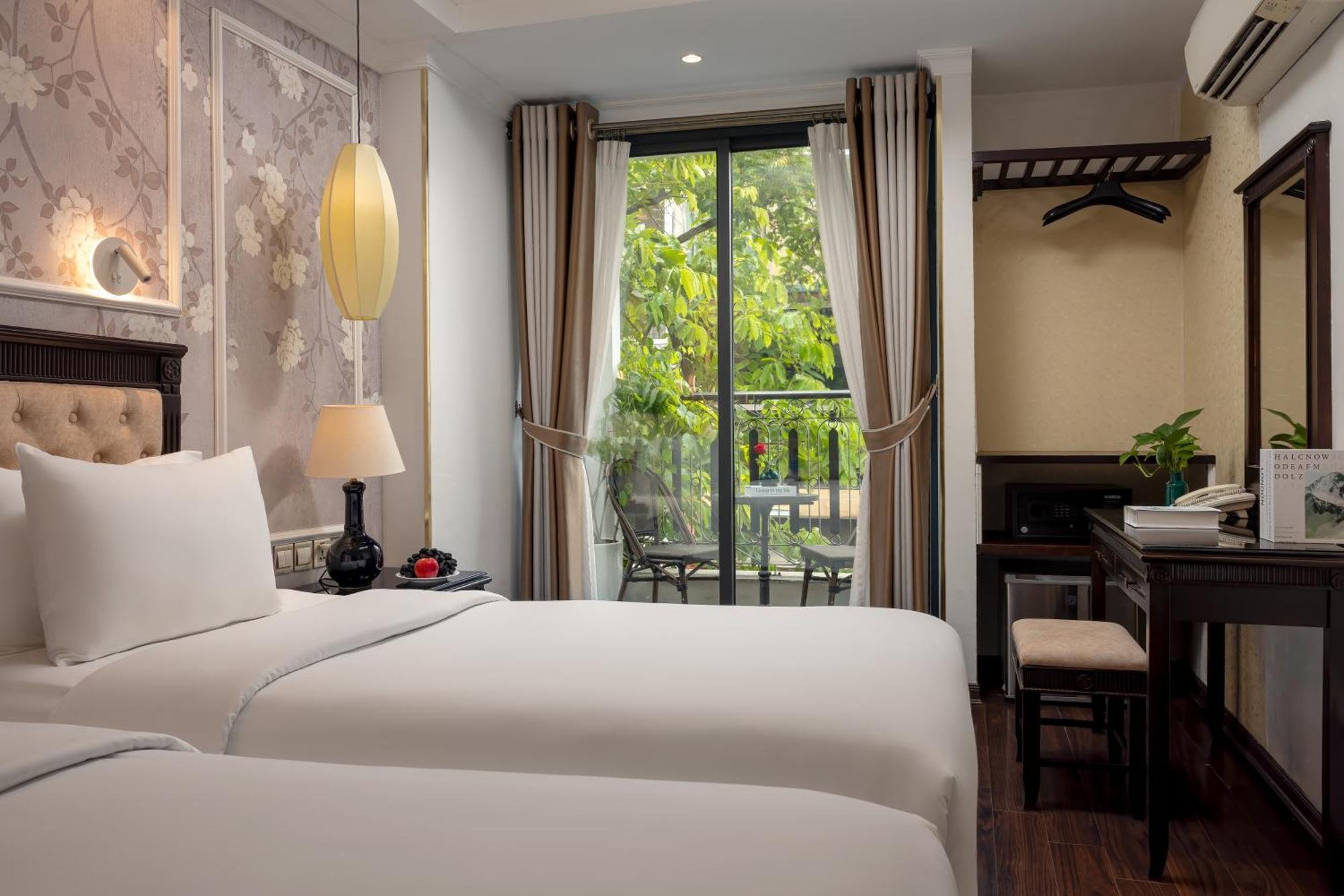 Suite Junior avec Chambre Lits Jumeaux et Balcon