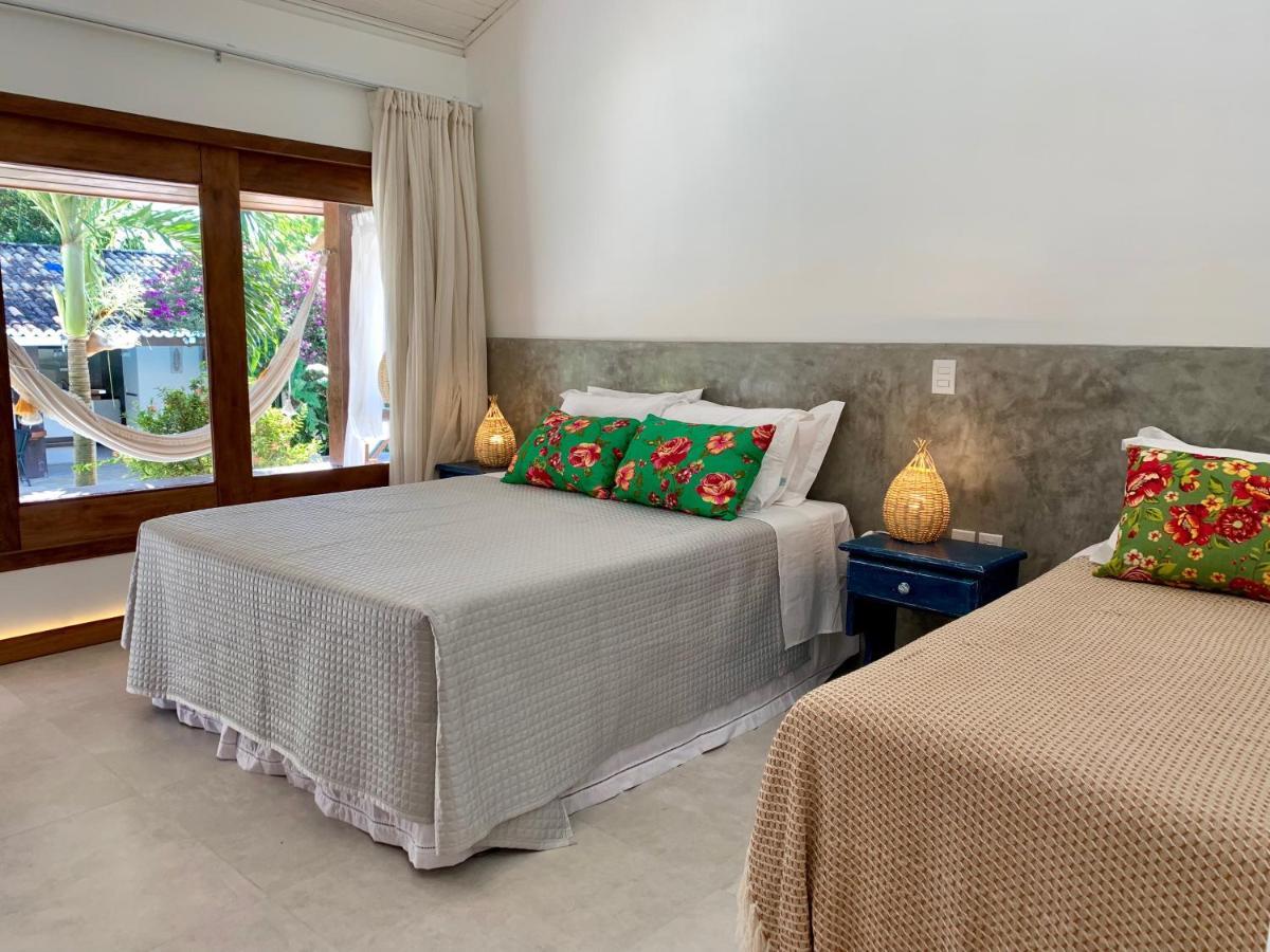 Quarto Triplo com Vista para a Piscina